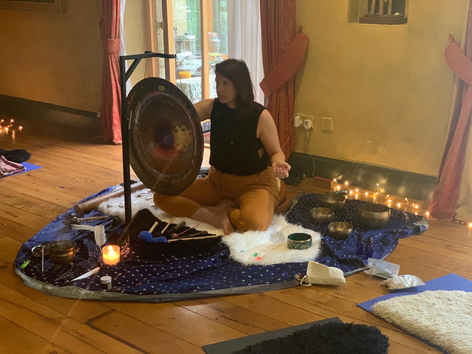 A sound healing session with gong and singing bowls